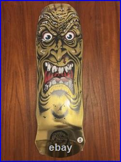 Santa Cruz Skateboard Deck Rob Roskopp Face Gold