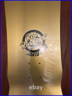 Santa Cruz Skateboard Deck Rob Roskopp Face Gold
